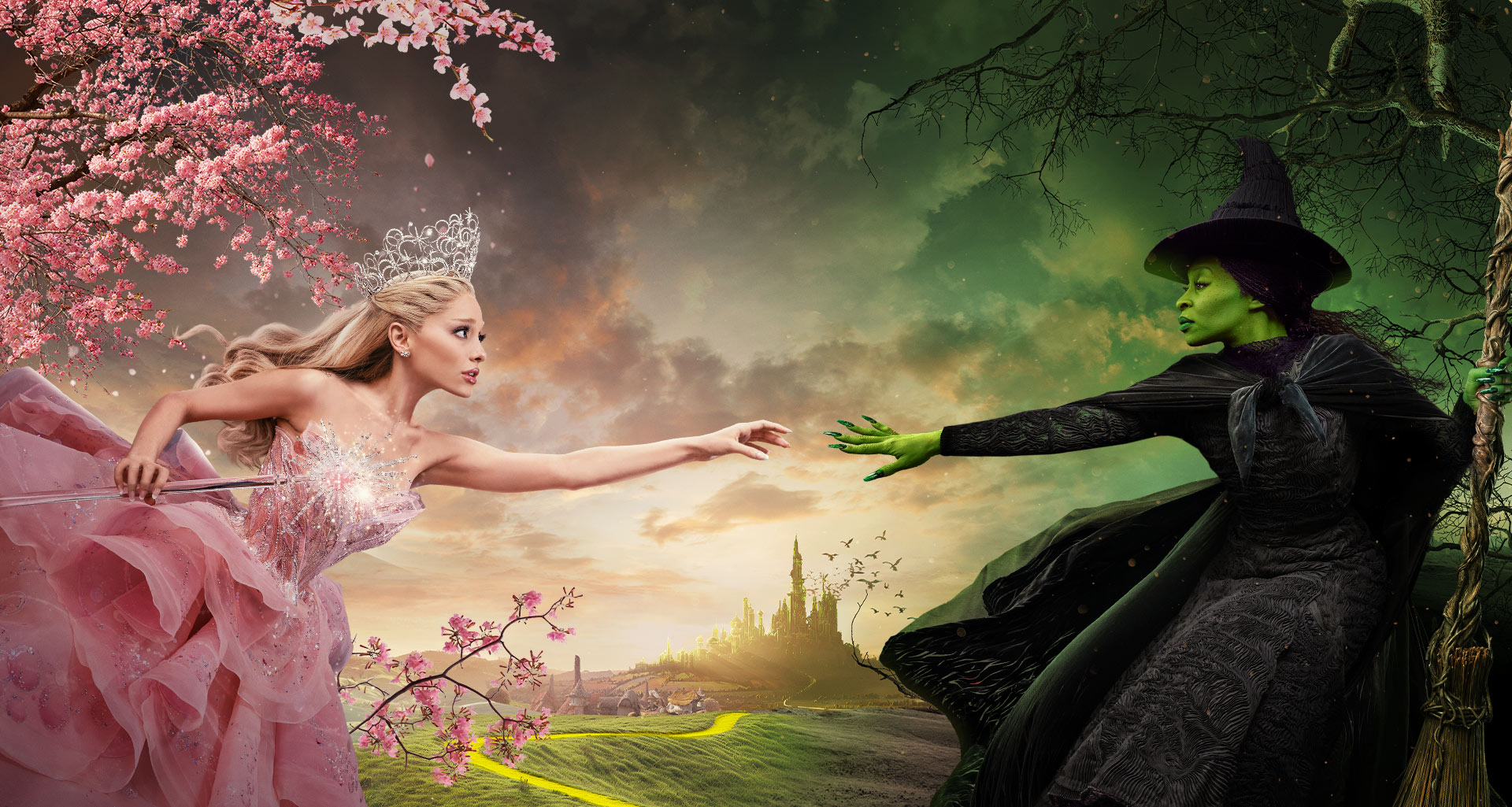 Uma imagem da Elphaba e da Glinda tentando se tocar com as pontas dos dedos